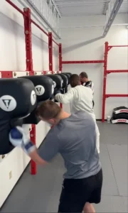 the guys doing some uppercuts in Mauy thai kickboxing class